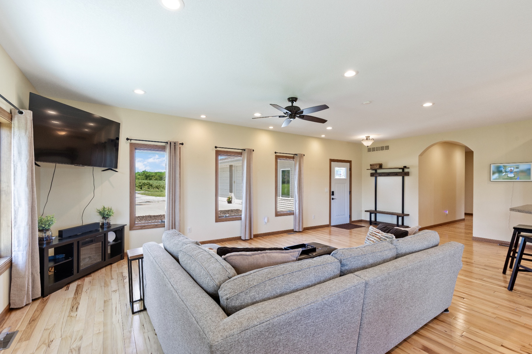 Living room facing the front windows and entry