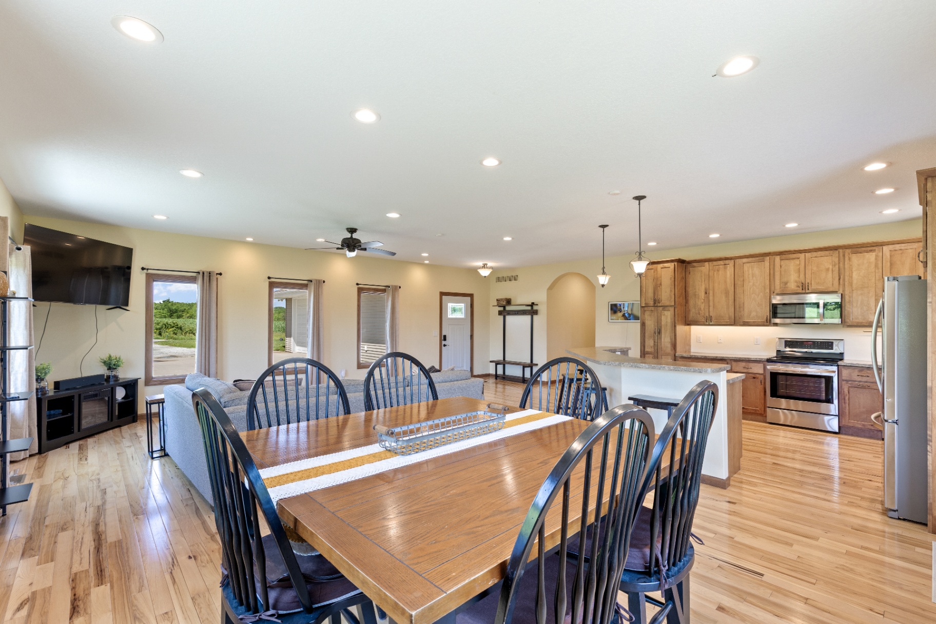 Dining area looking across the kitchen and living space