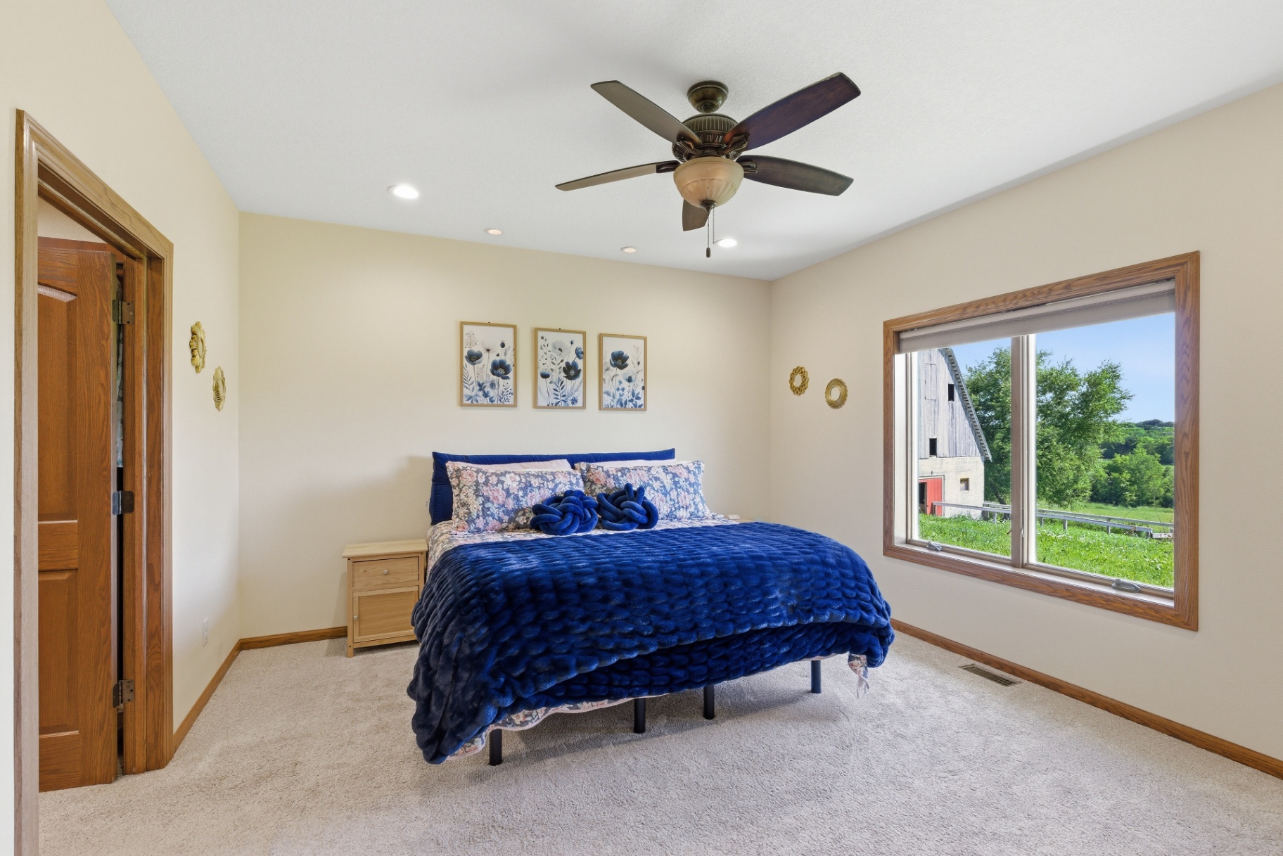 Primary bedroom with pasture views