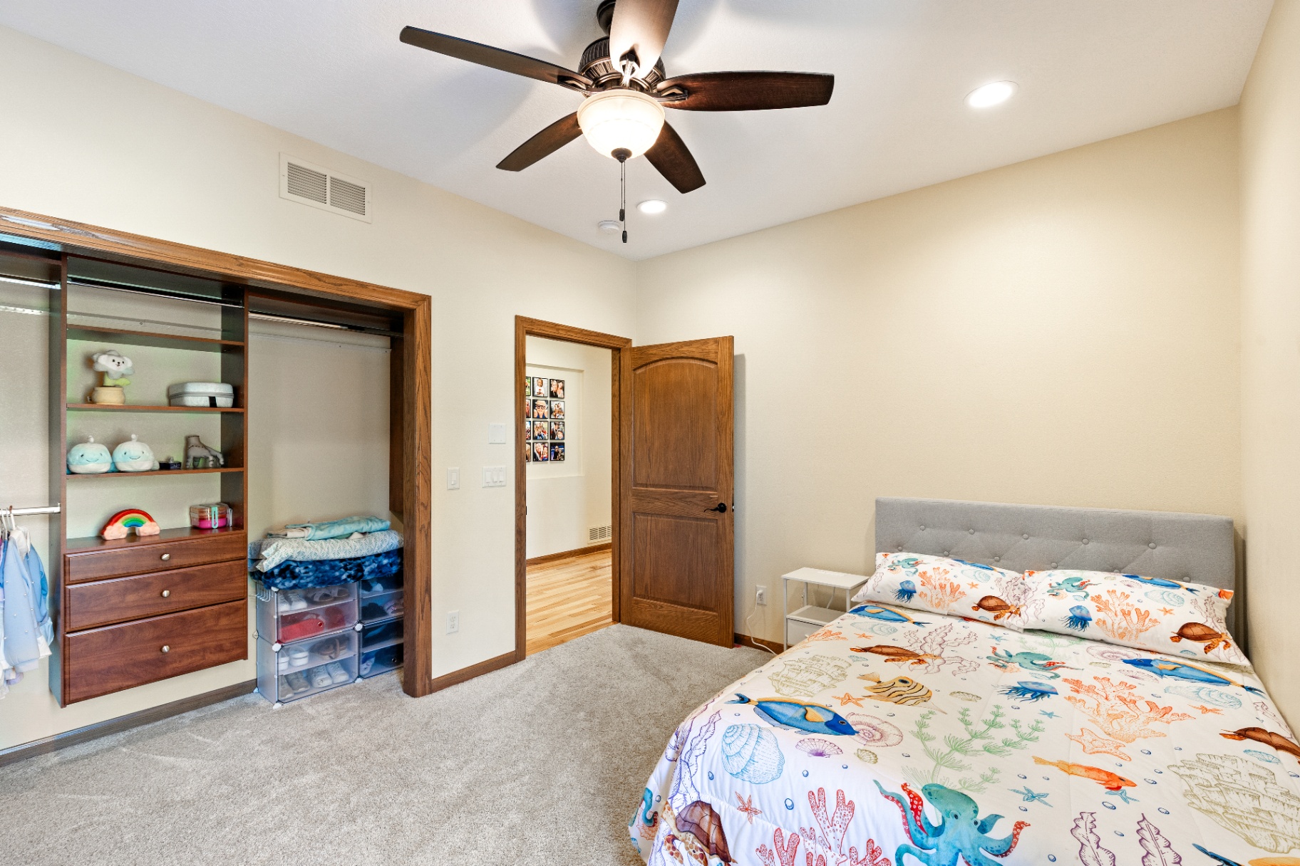 Guest bedroom with built-in closet shelving